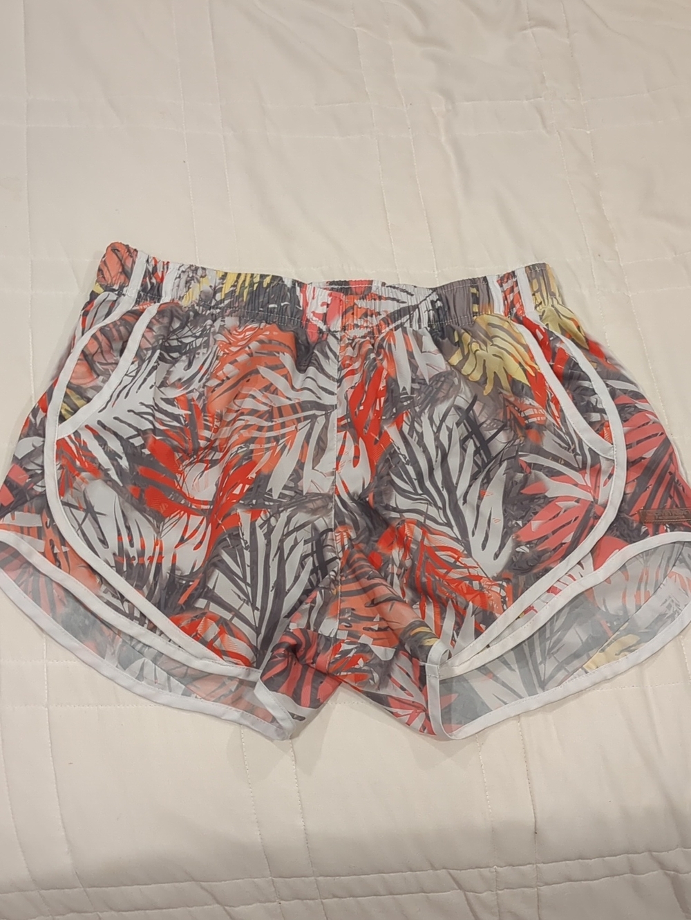 Calvin Klein Performance Tropical Print Athletic Shorts in Grey, Coral, & Yellow
